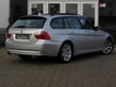 BMW 3-serie Touring - 320i Business Line PANORAMADAK|NAVIGATIE|AUTOMAAT|NTROL|ECC/AIRCO|PDC VOOR+ACH - 1 - Thumbnail