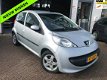 Peugeot 107 - 1.0-12V XS 5Dr/ Airco/ AUX/ 1e Eig/ NAP/ APK - 1 - Thumbnail