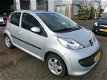 Peugeot 107 - 1.0-12V XS 5Dr/ Airco/ AUX/ 1e Eig/ NAP/ APK - 1 - Thumbnail