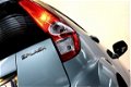 Suzuki Splash - 1.2 Exclusive AUTOMAAT 1eEIGNR AIRCO STOELVERW. '11 - 1 - Thumbnail