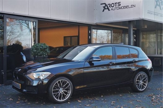 BMW 1-serie - 116i Executive Navi|Clima|Cruis|PDC 136PK Zwart Metallic - 1