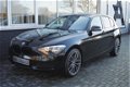 BMW 1-serie - 116i Executive Navi|Clima|Cruis|PDC 136PK Zwart Metallic - 1 - Thumbnail