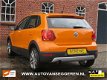 Volkswagen Polo - 1.2 TSI Cross 105PK/clima/cruise/xenon/navi/full option/1 eign/inclgarantie - 1 - Thumbnail