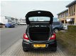 Opel Corsa - 1.4-16V Edition 1.4 AUTOMAAT, 5-D AIRCO/STOELVERW./STUURVERWARMING - 1 - Thumbnail