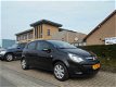 Opel Corsa - 1.4-16V Edition 1.4 AUTOMAAT, 5-D AIRCO/STOELVERW./STUURVERWARMING - 1 - Thumbnail