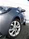 Opel Corsa - 1.4 Edition 5-drs (90pk) Airco / Cruise / Navi - 1 - Thumbnail