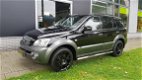 Kia Sorento - 2.5 CRDi M-bition 4X4 NL AUTO NAP AIRCO PANO DAK V.A €117, .-P/M - 1 - Thumbnail