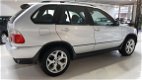 BMW X5 - Automaat 3.0d High Executive V.A €104, - P/M NL AUTO APK 02- 19 LEDER NAVI TV PDC CRUISE - 1 - Thumbnail