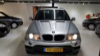 BMW X5 - Automaat 3.0d High Executive V.A €104, - P/M NL AUTO APK 02- 19 LEDER NAVI TV PDC CRUISE - 1 - Thumbnail