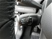 Peugeot 208 - 1.2 PureTech Signature Airco, Cruise, PDC, Bluetooth, Navi - 1 - Thumbnail