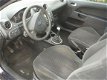 Ford Fiesta - 1.4i16v ghia geleverd met nwe apk - 1 - Thumbnail
