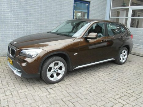 BMW X1 - 1.8i sDrive Inclusief Afleveringskosten - 1