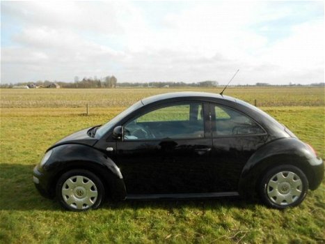 Volkswagen New Beetle - 1.9 TDI Highline - 1