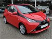 Toyota Aygo - 1.0 VVT-i X-Wave 5-drs Automaat - Nav | Camera | Airco | Leer - 1 - Thumbnail