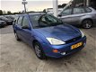 Ford Focus Wagon - 1.4i 16V Ambiente - 1 - Thumbnail