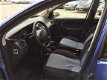 Ford Focus Wagon - 1.4i 16V Ambiente - 1 - Thumbnail