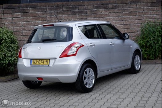 Suzuki Swift - - 1.2I 94PK 5 drs. Comfort airco/cruiscontrole/lmv15 - 1