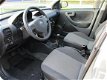 Opel Corsa - 1.2-16V Rhythm Centr. vergr. Cruise control - 1 - Thumbnail