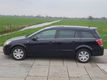 Opel Astra Wagon - 1.8 St.wgn. 2005 Zwart Cosmo/Panorama/Leer/Airco - 1 - Thumbnail