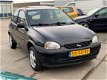 Opel Corsa - 1.2i-16V Onyx/Schuifdak/Stuurbkr/Elek.ramen/ - 1 - Thumbnail