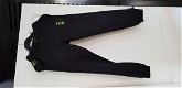 Datch Gym zwarte joggingbroek met neon gele print maat 140/146 - 1 - Thumbnail