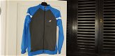 Nike trainingsjack licht blauw met grijs maat 158/170 - 2 - Thumbnail