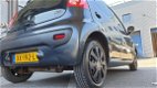 Peugeot 107 - 1.0-12V XR Airco/Elek pakk/Nw APK/Garantie - 1 - Thumbnail