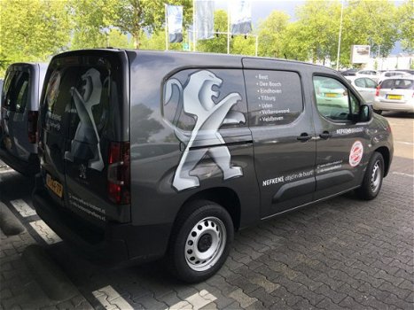 Peugeot Partner - 1.6 BlueHdi 100pk Premium Long | Navigatie | Airco | Parkeersensoren | 3-zits | - 1