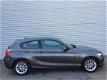 BMW 1-serie - 116 Coupe Urban Navi Bluetooth Climate 21.846 km - 1 - Thumbnail