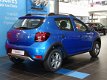 Dacia Sandero - TCe 90pk Stepway NIEUW Navig., Airco, Park. sens. Gratis accessoires - 1 - Thumbnail