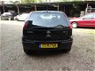 Opel Corsa - 1.2-16V Rhythm - 1 - Thumbnail