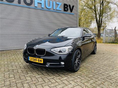 BMW 1-serie - 116i Executive Sport Line Bi-Xenon Navigatie PDC 18 Inch M Performance velgen Sportsto - 1