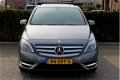 Mercedes-Benz B-klasse - 180 Ambition Aut Panoramadak Xenon Navi ECC PDC Cruise Chroom LMV Zeer nett - 1 - Thumbnail