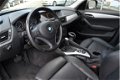 BMW X1 - 2.0d sDrive AUTOMAAT / NAVI / LEER / TREKHAAK / XENON - 1 - Thumbnail