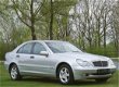 Mercedes-Benz C-klasse - W203 C 180 Kompressor Comfort Aut.-5 | 62.840 km. volledig gedocumenteerd | - 1 - Thumbnail