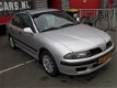 Mitsubishi Carisma - 1.6 Comfort Drive, dealer onderhouden - 1 - Thumbnail