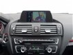 BMW 1-serie - 114i High Executive M-Sport (navi, xenon, sportstoelen) - 1 - Thumbnail