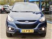 Hyundai ix35 - 2.0i 4WD AUTOMAAT, DYNAMIC, 87740KM, LEDER, CAMERA, - 1 - Thumbnail