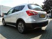 Suzuki S-Cross - EXCLUSIVE HOGE INSTAP AUTOMAAT CLIMA CRUISE KEYLESS 17 INCH LMV DAKRAIL - 1 - Thumbnail