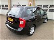 Kia Carens - 2.0 CVVT X-tra 73.659km 1e eigenaar dealer onderhouden - 1 - Thumbnail