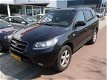 Hyundai Santa Fe - 2.7i V6 2WD DynamicVersion - 7 Persoons - 1 - Thumbnail