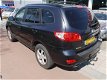 Hyundai Santa Fe - 2.7i V6 2WD DynamicVersion - 7 Persoons - 1 - Thumbnail