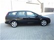 Ford Focus Wagon - 1.6 TDCI Futura AIRCO volledig Dealer ond - 1 - Thumbnail