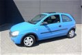 Opel Corsa - 1.0-12V Comfort - 1 - Thumbnail