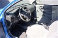 Opel Corsa - 1.0-12V Comfort - 1 - Thumbnail