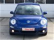 Volkswagen New Beetle - 2.0 Highline Aut./ LAGE KM's 69.000/APK./Airco/Leer/ Eerste eigenaar - 1 - Thumbnail