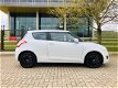 Suzuki Swift - 1.2 Exclusive Schuifdak, 2012, Stoelverwarming, AIRCO - 1 - Thumbnail