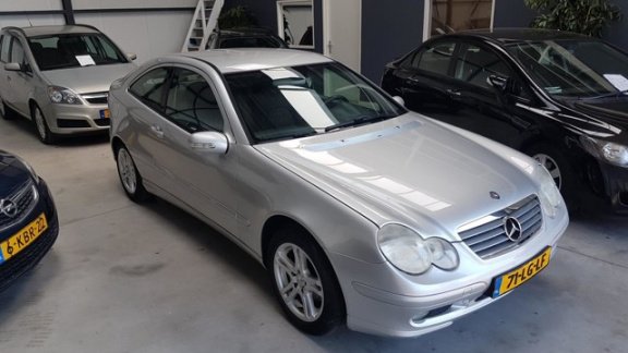 Mercedes-Benz C-klasse Sportcoupé - 200 K. - PDC - Cruise - LM - 1