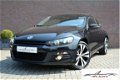 Volkswagen Scirocco - 1.4 TSI 160pk Edition * Xenon * Panoramadak * Half leer / blokstof * Multifunc - 1 - Thumbnail