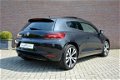 Volkswagen Scirocco - 1.4 TSI 160pk Edition * Xenon * Panoramadak * Half leer / blokstof * Multifunc - 1 - Thumbnail